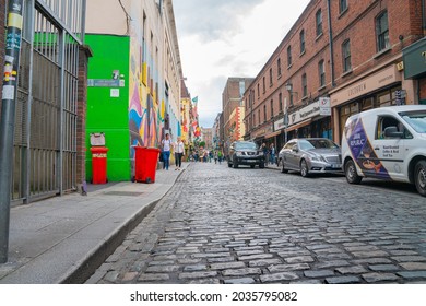 Dublin, IRELAND - AUGUST 9 2017; Dublin Cobbled Street Known As Bedford Row In Historic Temple Bar District With Vehicles Parked On One Side.