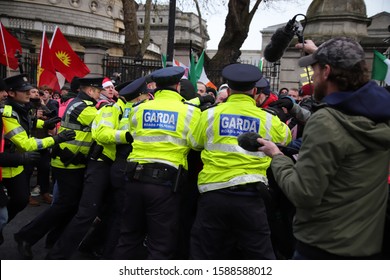 DUBLIN, IRELAND - DECEMBER 14, 2019: Rival Demonstrations By Anti-racism And Free Speech Groups Face Off Outside Parliament Buildings.