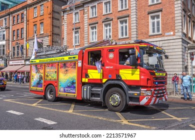 DUBLIN, IRELAND - Jun 25, 2022: A Yellow And Red Fire Engine Car In Dublin, Ireland During Pride March