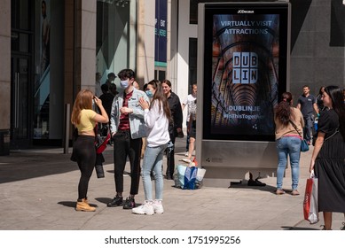 Dublin, Ireland - June 08 2020: Group Of Teenagers Wearing Masks On Henry Street During Covid 19 Lockdown