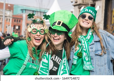 Dublin, Ireland - MAR 17: St. Patrick's Day, people with green hats in temple bar on March 17, 2019 in New  Dublin, Ireland.