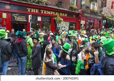 DUBLIN, IRELAND - MARCH 17: Saint Patrick's Day parade in Dublin Ireland on March 17, 2014: People dress up Saint Patrick's at The Temple Bar