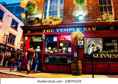 DUBLIN, IRELAND - NOVEMBER 11, 2014: Nightlife at popular historical part of the city - Temple Bar quarter in Dublin, Ireland. The area is the location of many bars, pubs and restaurants
