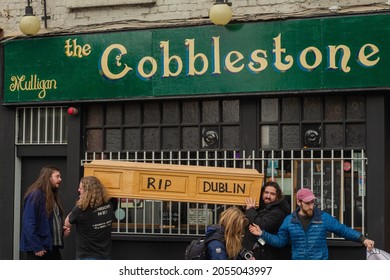 Dublin, Ireland - October 9th 2021

A Coffin Is Carried Through Dublin To Symbolise The Destruction Of The Culture And History, In Protest For The Cobblestone Pub  Merchants Arch 