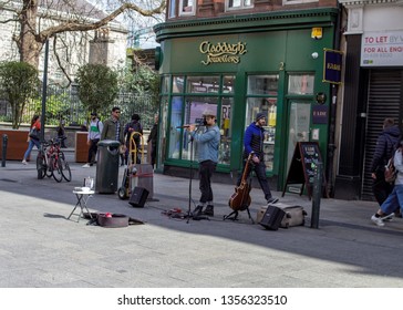 Dublin, Ireland,25th March 2019.  A Busker Performing In Grafton Street.