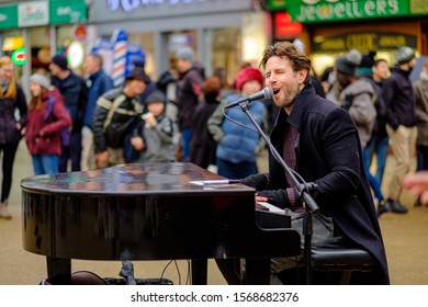 Dublin, Ireland,November23, 2019 Busker Plays Piano On Grafton Street.