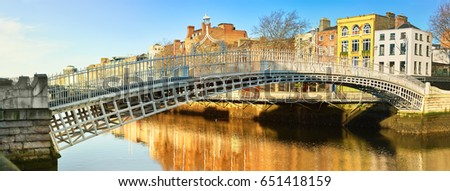 Dublin, panoramic image of Half penny bridge, or Ha'penny bridge, on a bright day