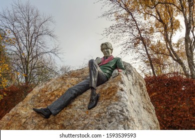 DUBLIN, REPUBLIC OF IRELAND - NOVEMBER 29, 2019: The Oscar Wilde memorial sculpture at Merrion Square in Dublin, Republic of Ireland