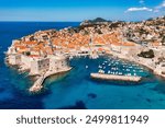 Dubrovnik a city in southern Croatia fronting the Adriatic Sea, Europe. Old city center of famous town Dubrovnik, Croatia. Picturesque view on Dubrovnik old town (medieval Ragusa) and Dalmatian Coast.