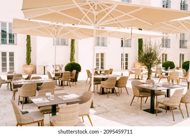 Dubrovnik, Croatia - 15 July 2021: Street Cafe Under Sun Umbrellas In Perast, Montenegro.