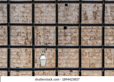 Dubrovnik: Lamp On The Wall Behind Bars