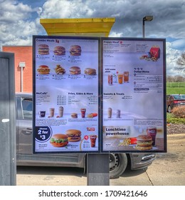 DUBUQUE, IOWA, April 20, 2020–Closeup Photo Of Limited McDonalds Restaurant LIMITED Menu In Lieu Of Covid-19 Pandemic On Sunny Spring Day.