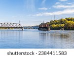 Dubuque Railroad bridge opens to allow river cruise boat to pass on Upper Mississippi in Dubuque Iowa