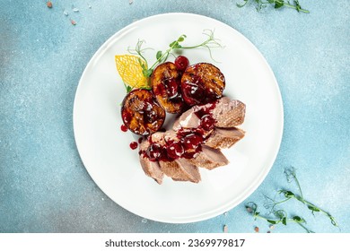 Duck breast fillets steak with plums, banner, menu, recipe place for text, top view,