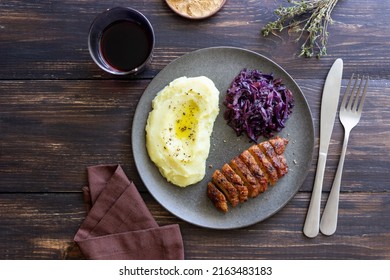 Duck Breast With Mashed Potatoes And Red Cabbage