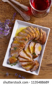 Duck Breast With Orange Sauce On White Plate. Duck Breast Fillet Steak. Overhead, Vertical