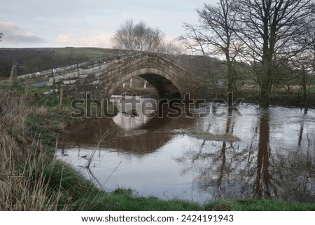 Duck Bridge on the River Esk near Danby in North Yorkshire.
After heavy rain the water is at least 8 feet above normal level.