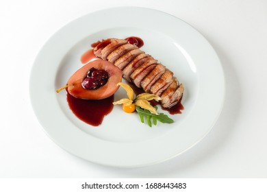 Duck fillet with cherry sauce and stewed pear