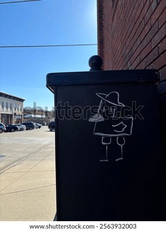 Duck with a hat on mailbox