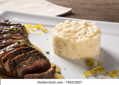 Duck Magret With Tucupi Sauce And Jambu Risotto.