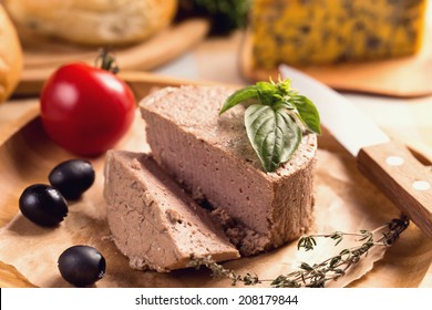 Duck Pate On Plate With Basil And Knife