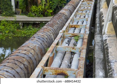 Duct Bank Old Water Pipe Line Beside The Concrete Bridge,THAILAND.
