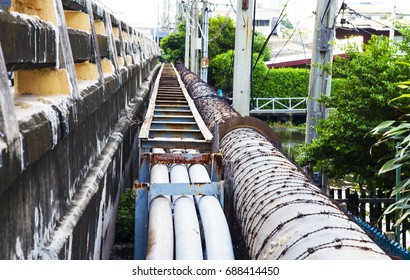 Duct Bank Old Water Pipe Line Beside The Concrete Bridge,THAILAND.
