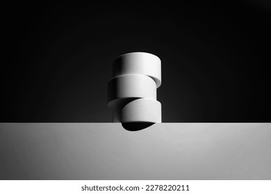 Duct tape rolls mockup template standing on a table side, deep shadows, real photo. Isolated surface to place your design. 