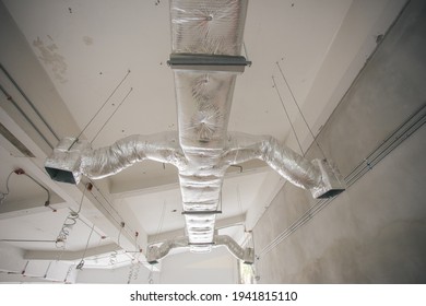 Ducting Work For Air Conditioner Ceiling Type. Installation AC Ductwork In The Construction Site.