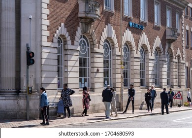 DUDLEY, UK - 2020: Barclays Bank Social Distancing Queue Of People In Dudley UK During Coronavirus Crisis