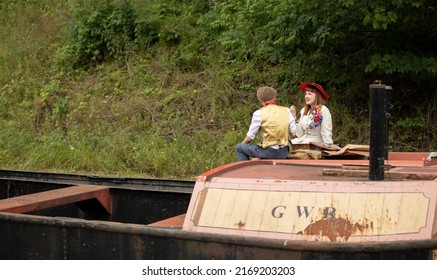 Dudley, West Midlands-united Kingdom July 13 2019 Young Man And Woman Having A Picnic On A Canal Boat 1940's Concept