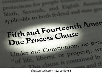 Due process clause to fifth and fourteenth Amendments spotlighted in business ethics textbook on United States law - Shutterstock ID 2242459953