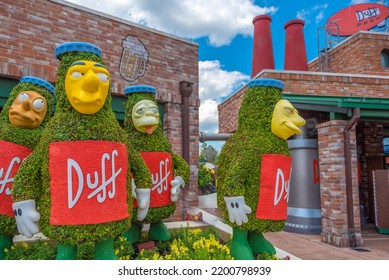 Duff Beer Cartoon Animation Statues From The Television Show The Simpsons In Universal Studios Orlando, Florida United States On March 24, 2019