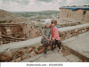 Duhok,Iraq - March 20, 2016: Escaped Syrian Kurdish Girls Living In Iraqi Northern Part With Thier Mother After ISIS Attacked Thier Village