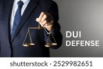 DUI Defense, featuring a gavel, handcuffs, and legal documents on a desk. Ideal for content on criminal law, defense attorneys, and court proceedings.