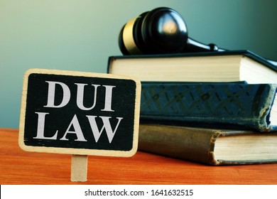 DUI Law Driving Under The Influence Sign And Books.