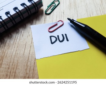 DUI  writting on table background.