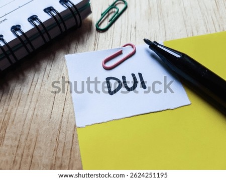 DUI  writting on table background.