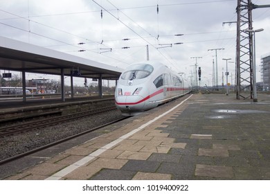 DUISBURG, GERMANY - JANUARI 22, 2018; Intercity Express (ICE) train leaving the old station Duisburg HBF  - Shutterstock ID 1019400922