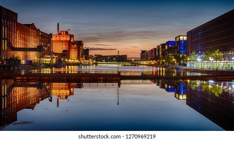 Duisburg inner habor at blue hour with reflections North Rhine Westphalia Germany
