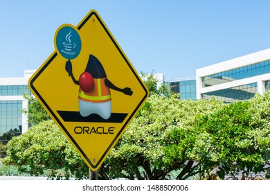 Duke, The Java Mascot In Construction Uniform Road Warning Sign Near Oracle Headquarters Campus In Silicon Valley - Redwood Shores, California, USA - Circa, 2019