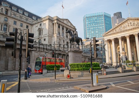 Duke Wellington statue, Royal Exchange and Bank of England in the City of London in England. People on the background