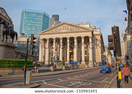 Duke Wellington statue and Royal Exchange in the City of London in England. People on the background