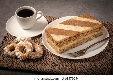 Dulce De Leche Cake With Coffee And Donuts.