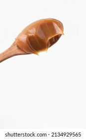 Dulce De Leche In A Wooden Spoon