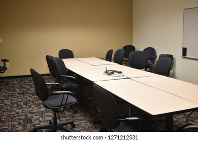 Dull Office Conference Room In An Office Black Chairs Neutral Colors