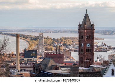 DULUTH, MN - OCTOBER 2020 - A High Angle Telephoto Shot Compressing the Duluth Lift Bridge, Minnesota Point, and the Clock Tower at Duluth's Adult Learning Center on a Beautiful Fall Day