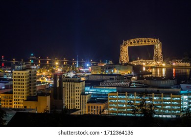 DULUTH, MN - SEPTEMBER 2016 - A Telephoto Shot of Downtown Duluth, Minnesota and the Aerial Lift Bridge Illuminated during a Nighttime Long Exposure