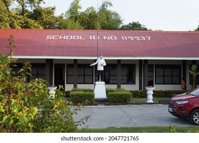 Dumaguete City, Philippines; 19 August 2021: The old Magsaysay Memorial Elementary School features a statue of the late President Ramon Magsaysay, and is considered a heritage school  building.