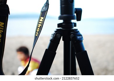 DUMAGUETE CITY, PHILIPPINES - Feb 01, 2015: A closeup shot of a Nikon camera at a beach during the day